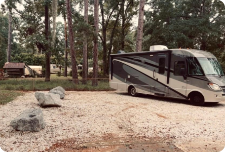 Spacious full hookup RV site with 30 and 50 amp service at Roses RV River Resort