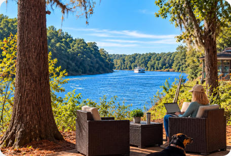Guest using free Wi-Fi while relaxing at Roses RV River Resort